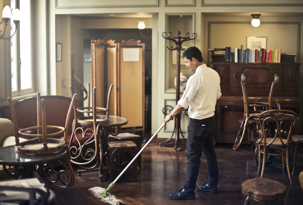 Photo by Andrea Piacquadio: https://www.pexels.com/photo/male-employee-cleaning-floor-in-restaurant-3769711/